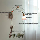 Helnys Pink Glass LED Swing Arm Wall Sconce