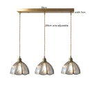 Helnys Nordic Copper Glass Hanging Pendant Light for Modern Living Spaces